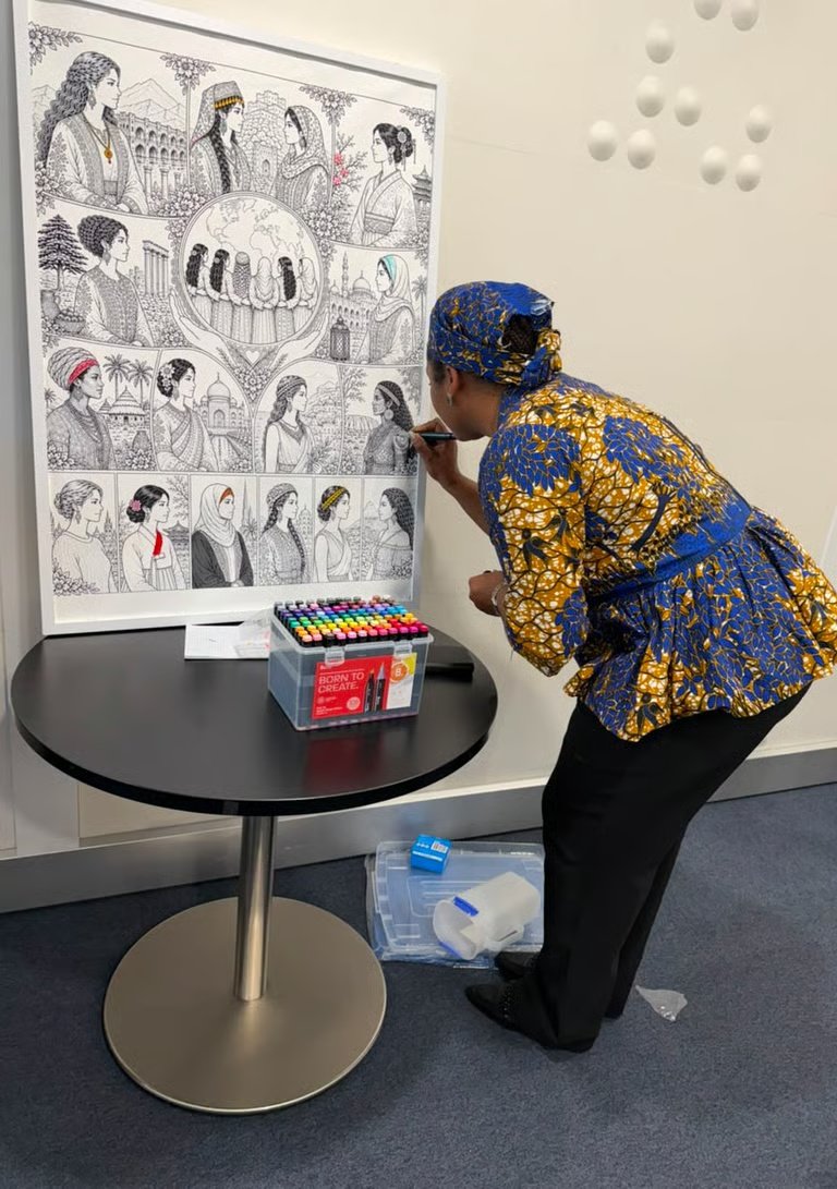 Women participating in a creative community activity