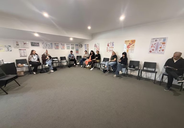 Women participating in a community session
